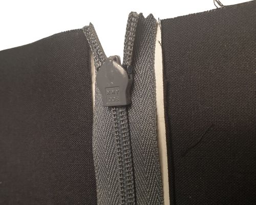 zip between halves of back panel