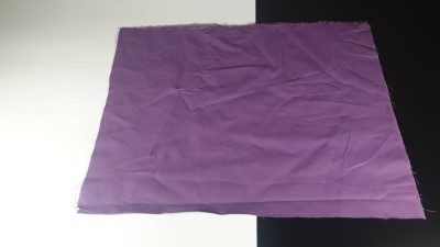 creased purple fabric